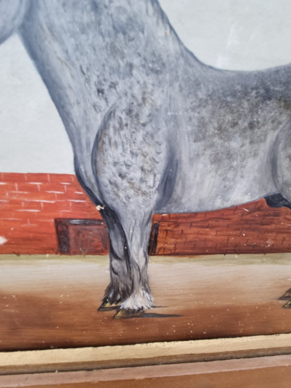A EARLY 20THC NAIVE SIGNED OIL ON BOARD OF A PERCHERON GREY . View III