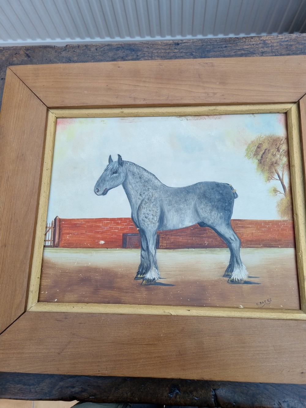 A EARLY 20THC NAIVE SIGNED OIL ON BOARD OF A PERCHERON GREY . View V