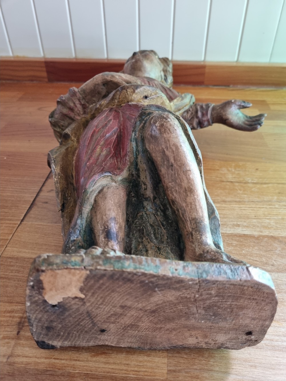 A LATE 16THC EUROPEAN POLYCHROME CARVING OF A MALE View V