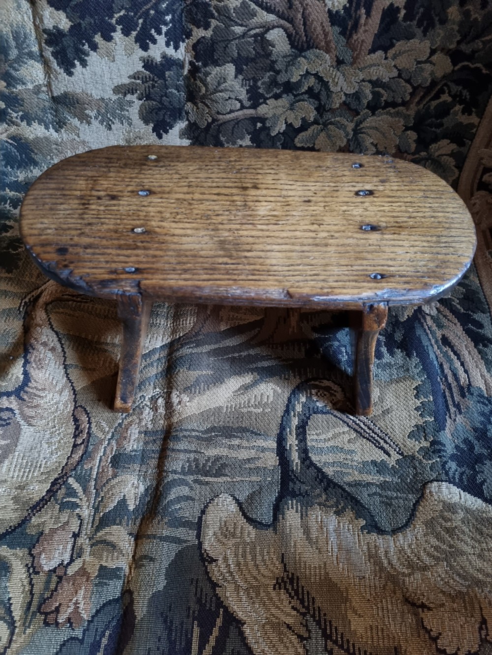 A 19TH C RUSTIC ELM STOOL.OF GOOD COLOUR View V