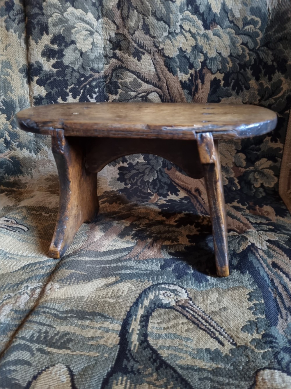 A 19TH C RUSTIC ELM STOOL.OF GOOD COLOUR View VI