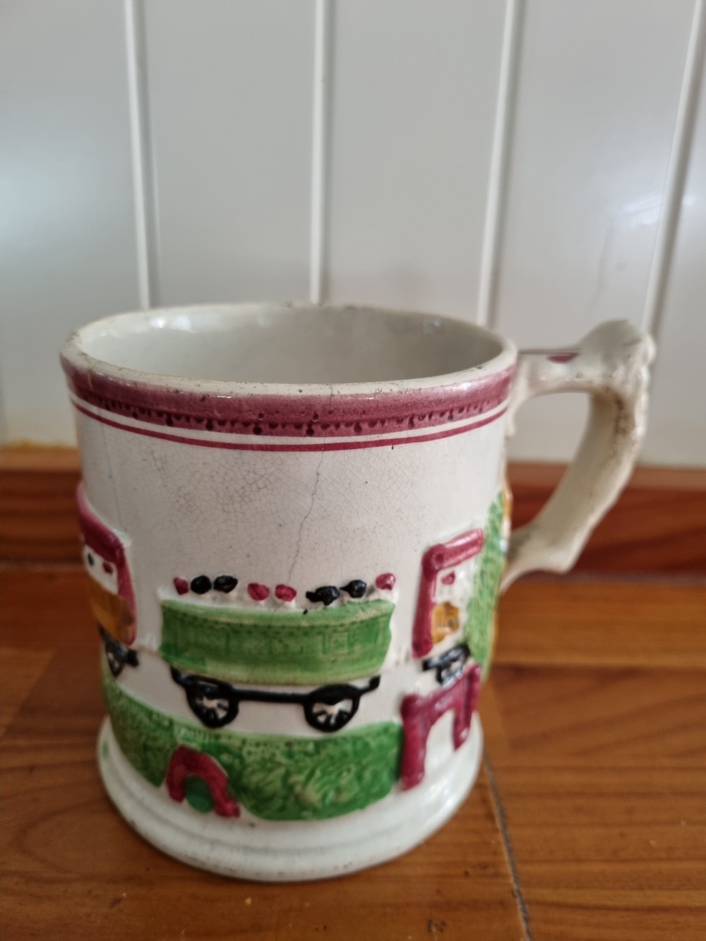 A RARE PRIMITIVE MID 19THC POTTERY MUG OF THE 