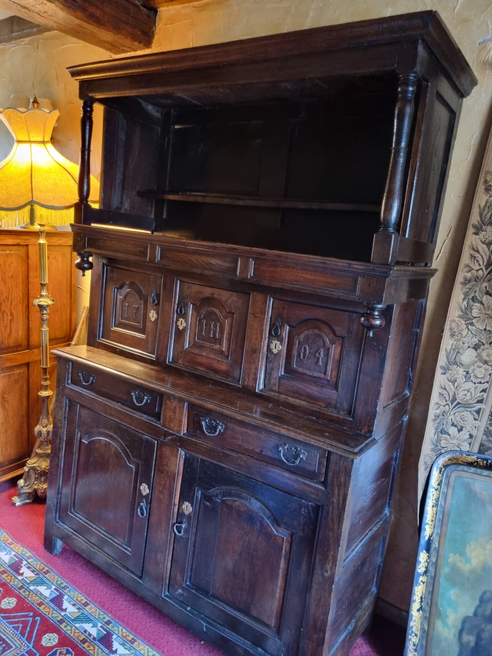 A EARLY 18THC WELSH DATED TRIDARN(3 PART CUPBOARD/DRESSER) View II