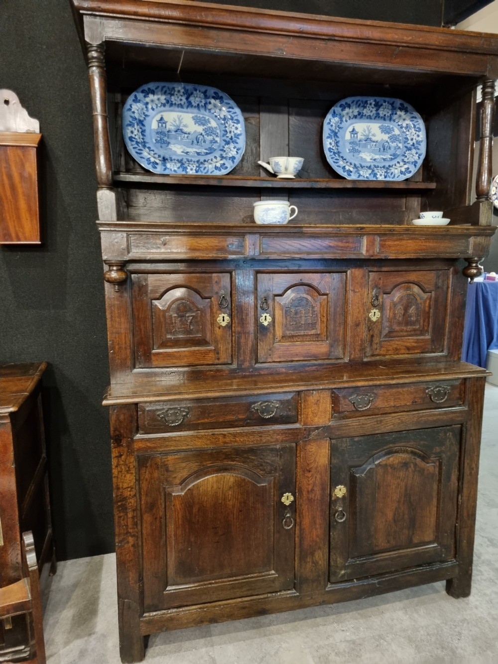 A EARLY 18THC WELSH DATED TRIDARN(3 PART CUPBOARD/DRESSER)
