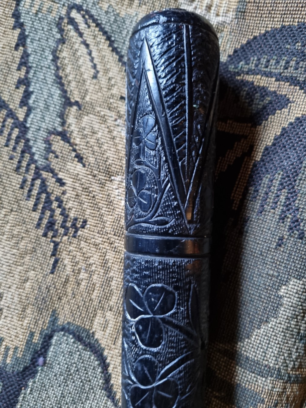 AN IRISH BOG OAK CARVED TRUNCHEON . View II