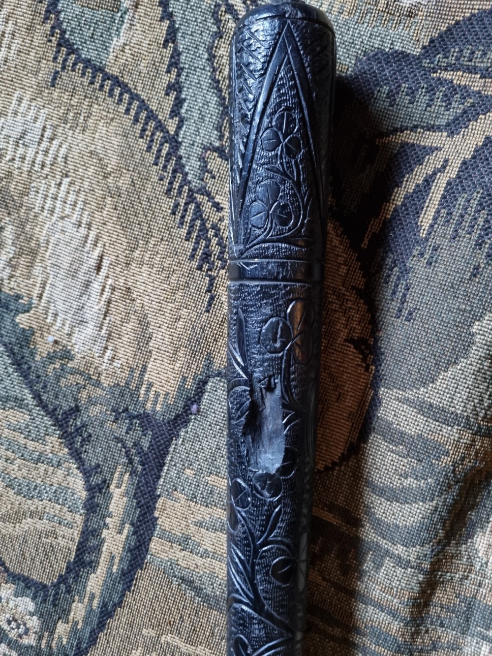 AN IRISH BOG OAK CARVED TRUNCHEON . View IV
