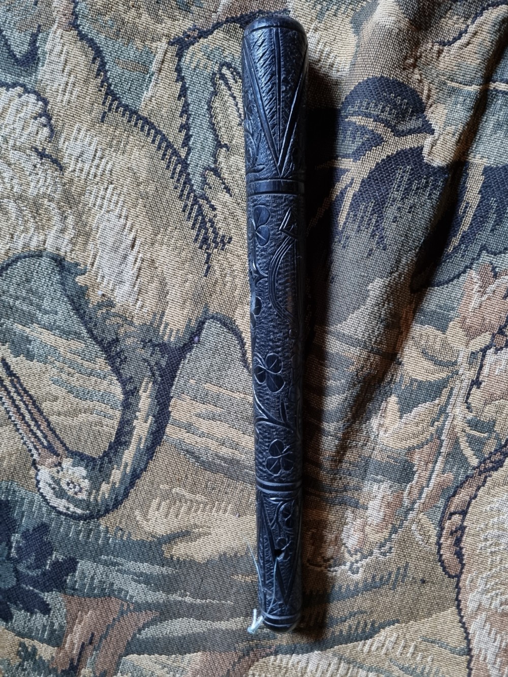 AN IRISH BOG OAK CARVED TRUNCHEON . View VI