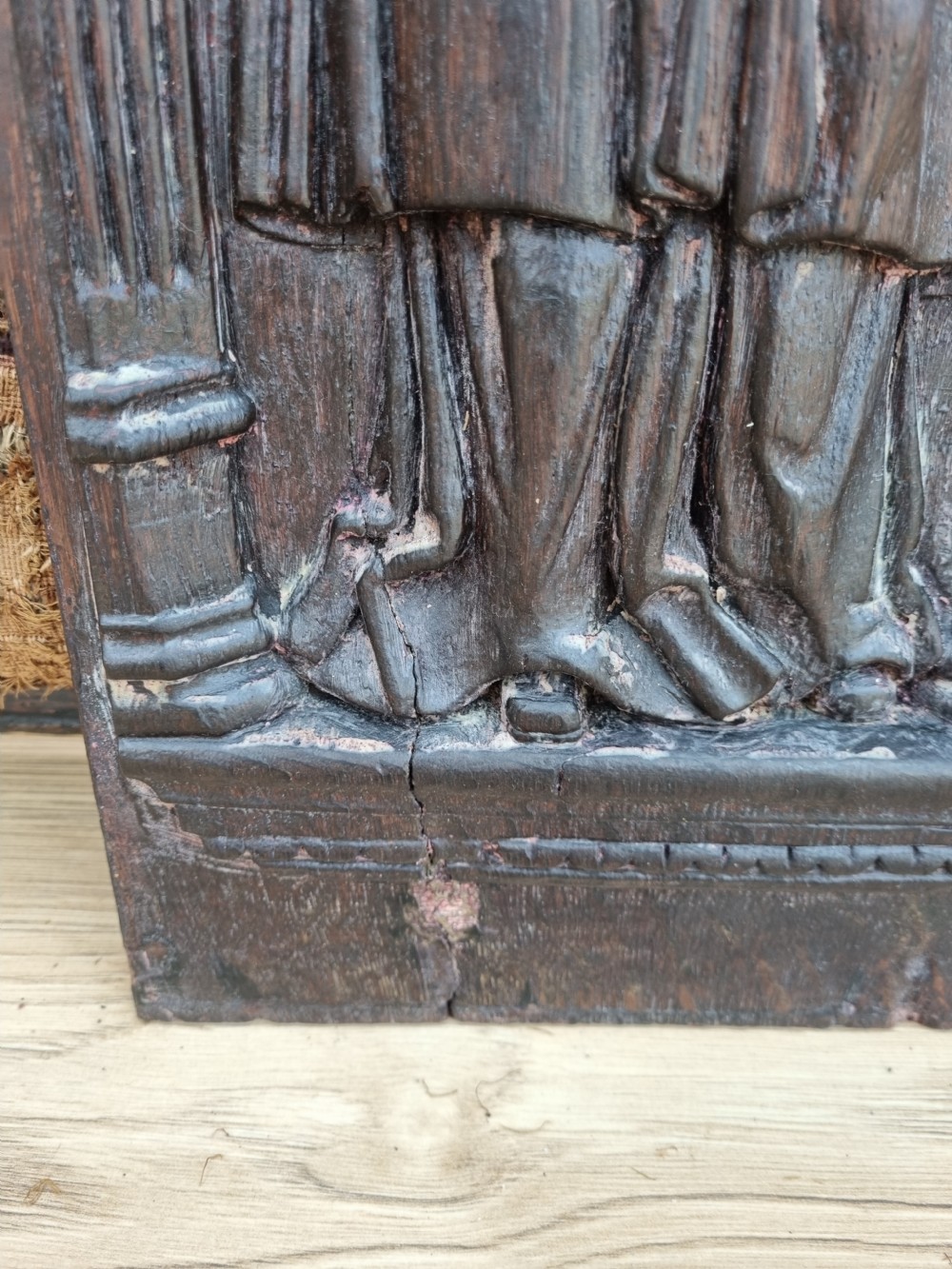 E 17THC OAK CARVED PANEL OF A LADY HOLDING A SKULL AND ORB. View IV