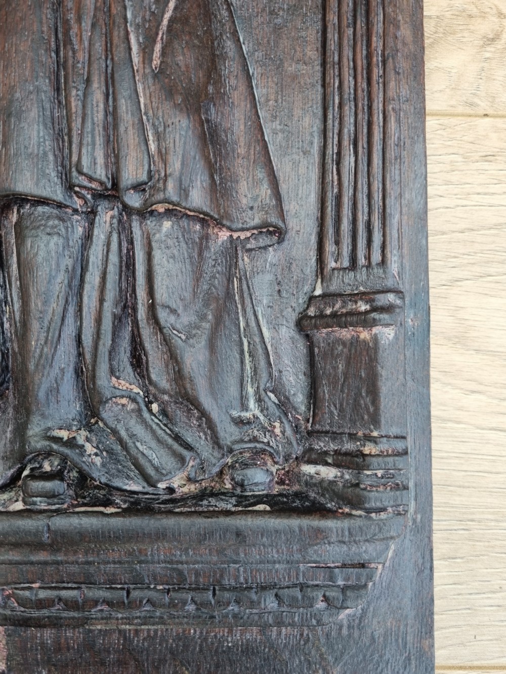 E 17THC OAK CARVED PANEL OF A LADY HOLDING A SKULL AND ORB. View VI