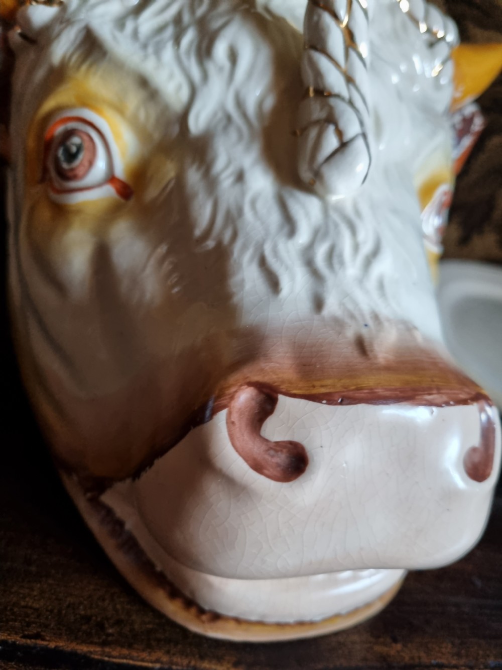 A LARGE ANTIQUE POTTERY COW,S HEAD TONGUE DISH AND COVER View II
