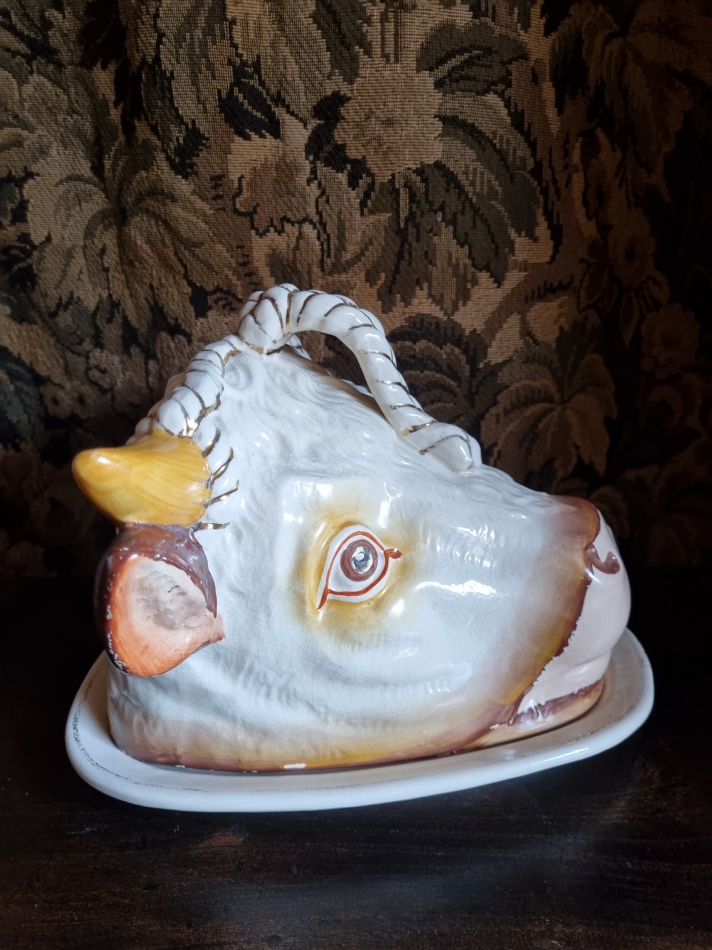 A LARGE ANTIQUE POTTERY COW,S HEAD TONGUE DISH AND COVER View IV