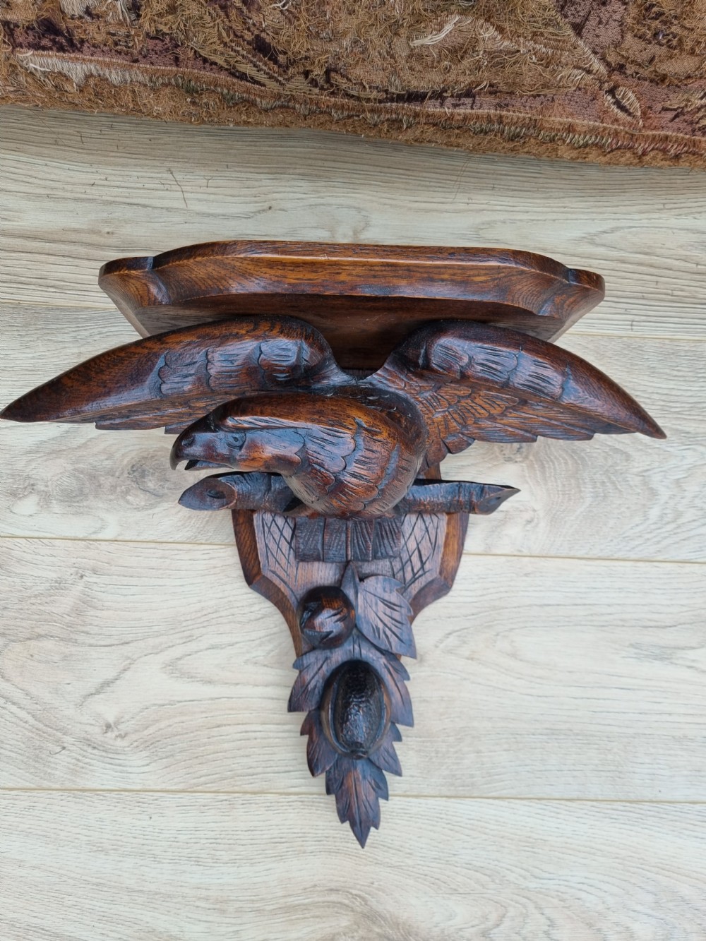 A GOOD LARGE BLACK FOREST CARVED EAGLE SHELF/WALL BRACKET
 View III