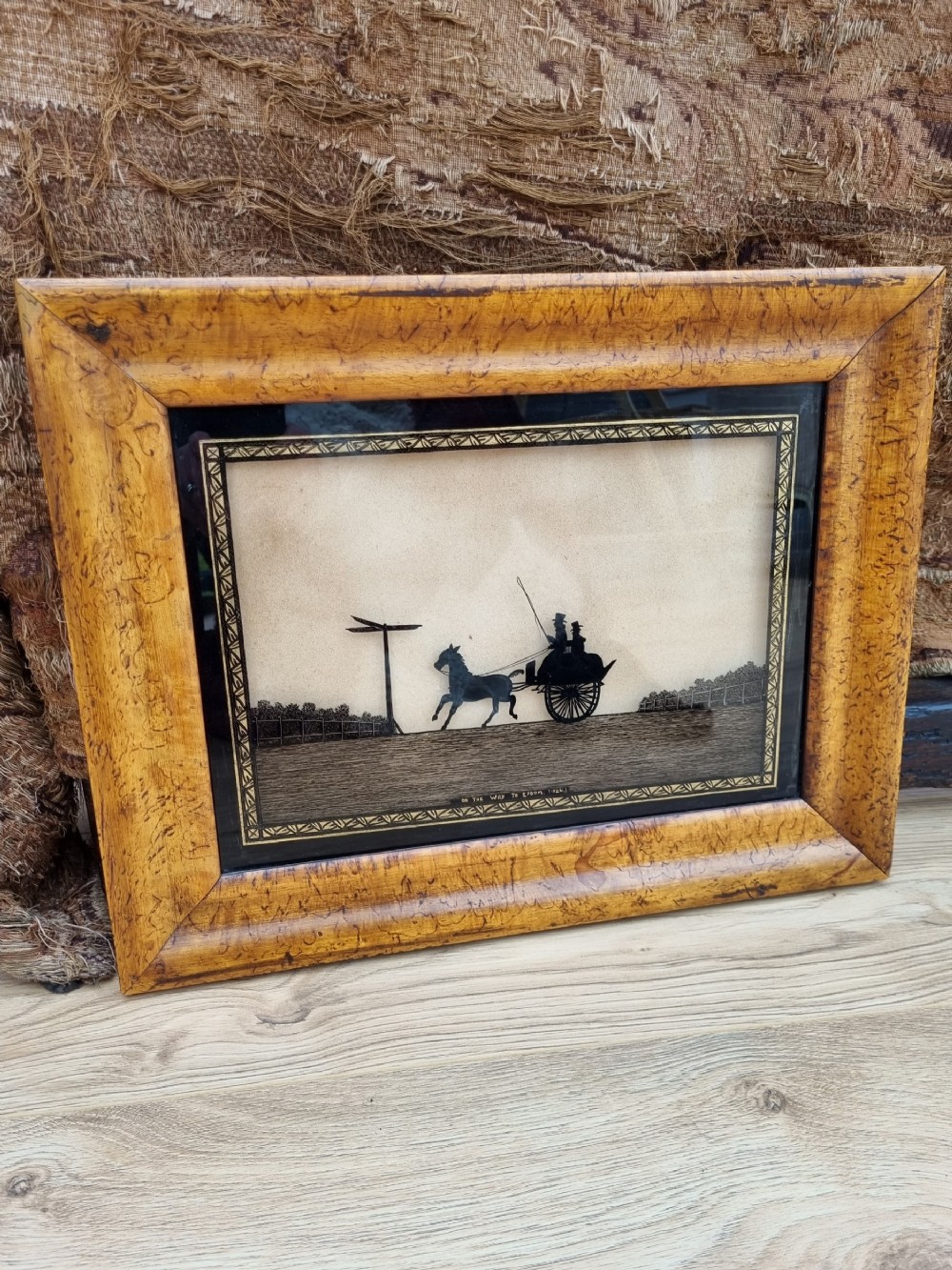 GOOD DATED REVERSE GLASS PICTURE OF CARRIAGE ON EPSOM DOWNS