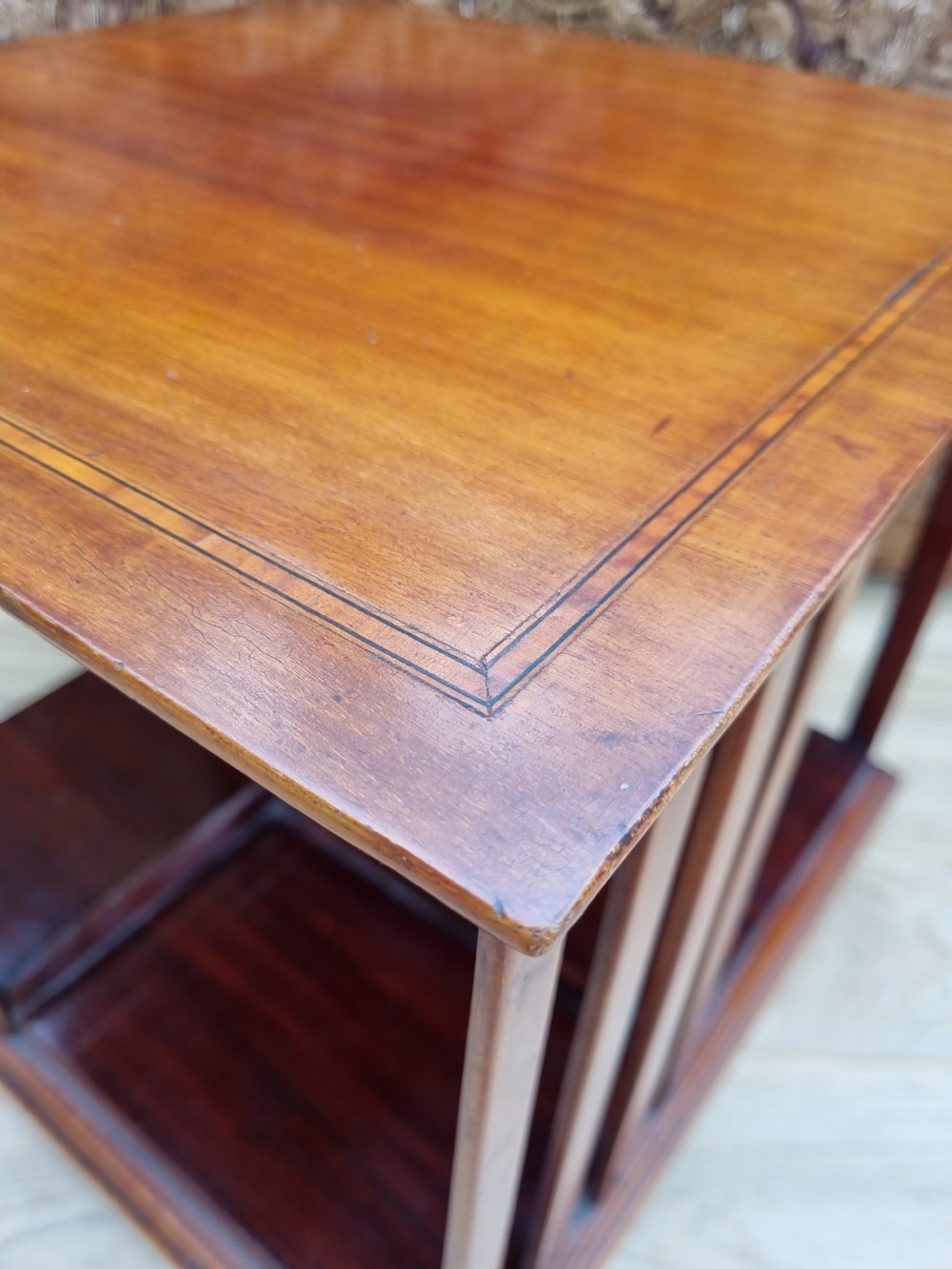 A SATINWOOD BANDED MAHOGANY TABLE REVOLVING BOOKCASE
 View III