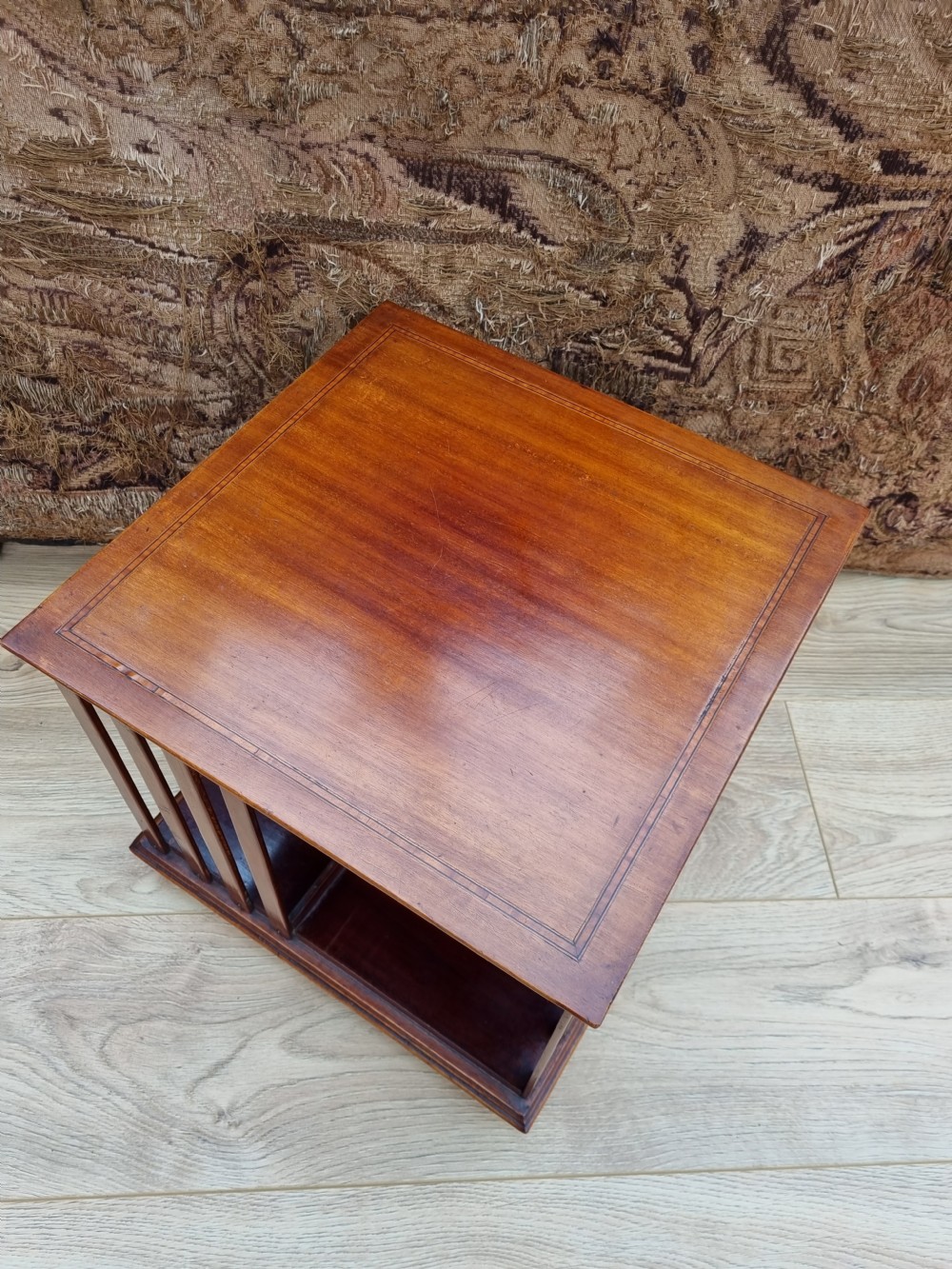 A SATINWOOD BANDED MAHOGANY TABLE REVOLVING BOOKCASE
 View V