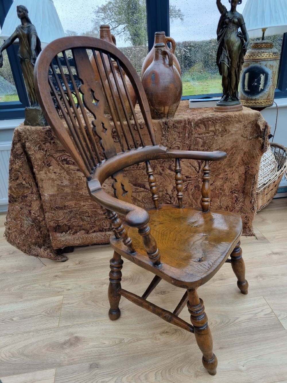 A GOOD MID 19THC ASH AND ELM BROAD ARM WINDSOR ARMCHAIR 