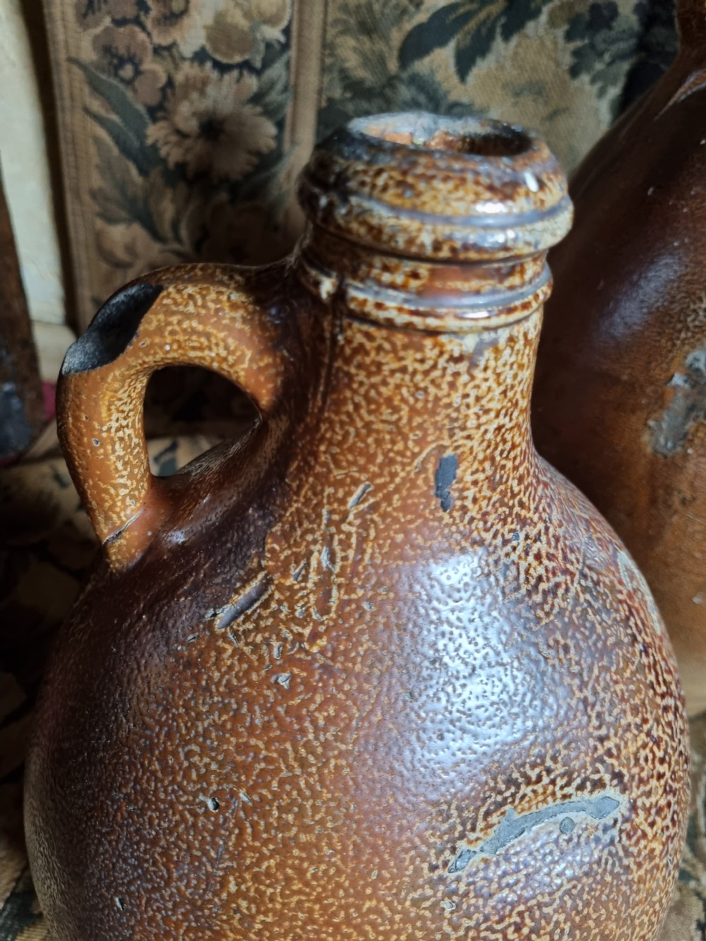 A MATCHED SET OF 4 17TH C STONEWARE  WINE JARS (BELLAMINES) View III