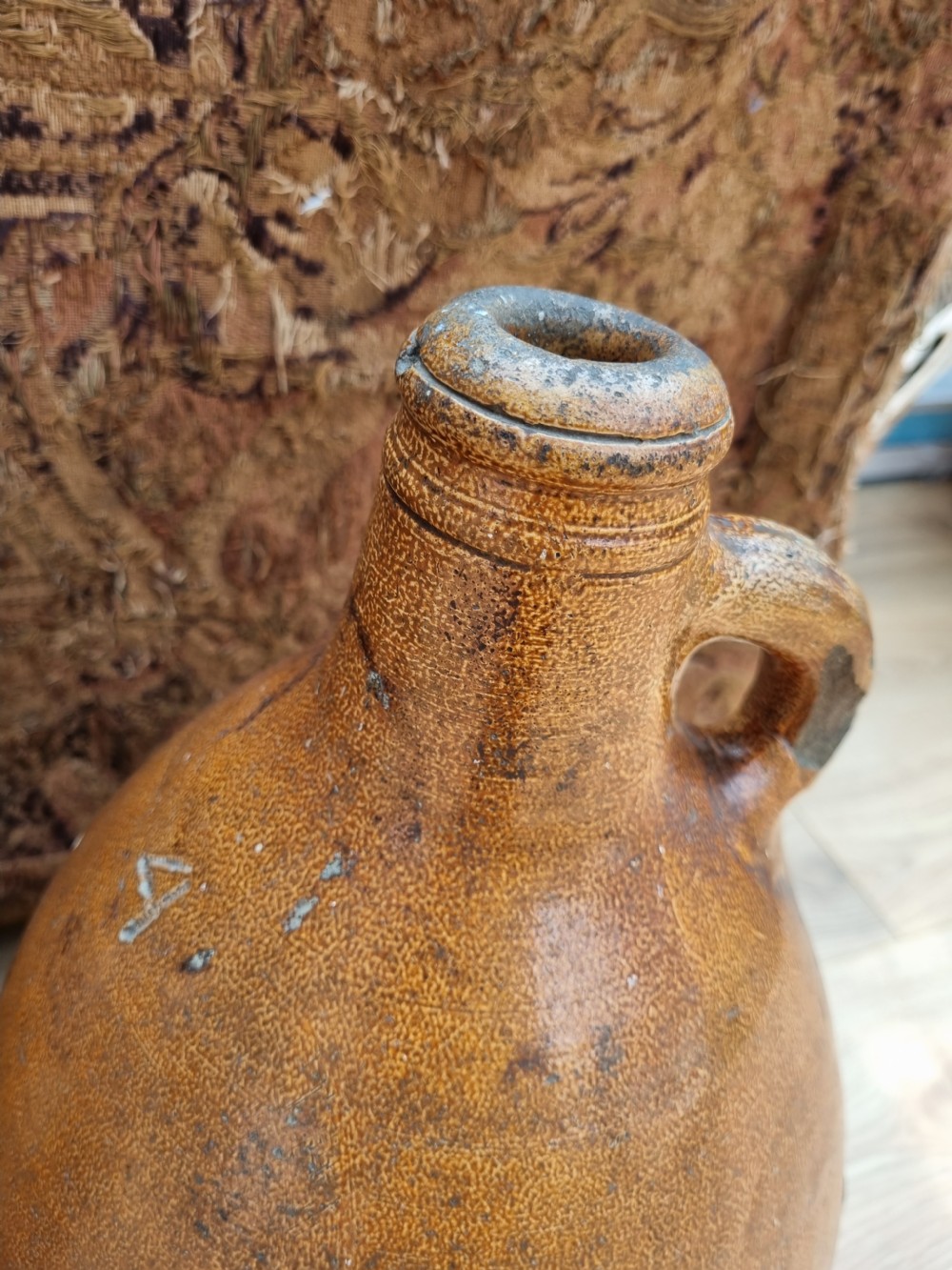 A MATCHED SET OF 4 17TH C STONEWARE  WINE JARS (BELLAMINES) View V