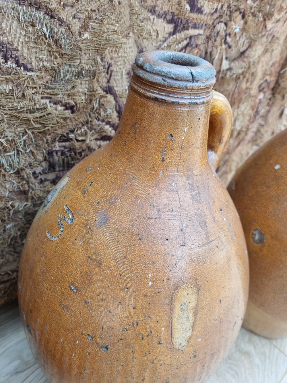 A MATCHED SET OF 4 17TH C STONEWARE  WINE JARS (BELLAMINES) View VI