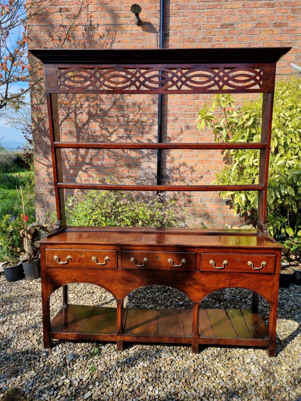 A FINE LATE GEORGIAN MID WALES OAK POTBOARD DRESSER  View III