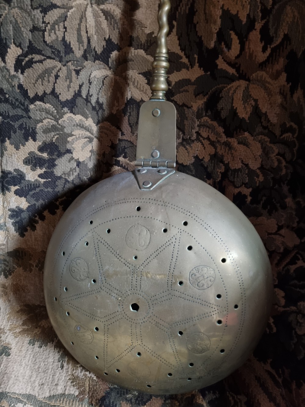 17THC BRASS HANDLED EMBOSSED OVAL WARMING PAN  View II