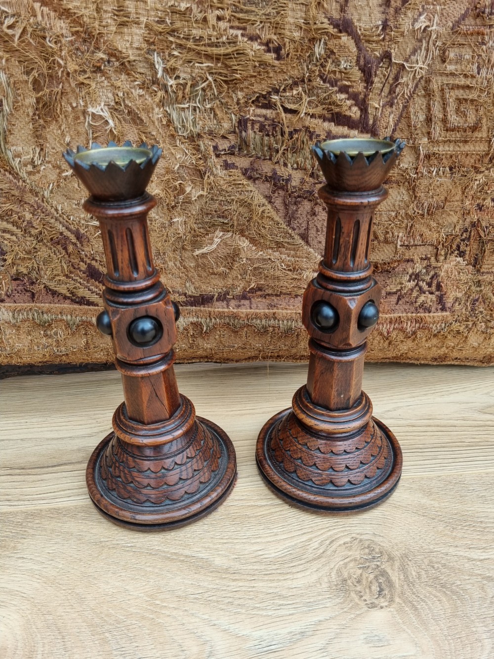 A PAIR OF OAK AND EBONIZED GOTHIC CANDLESTICKS BY A W PUGIN View VI
