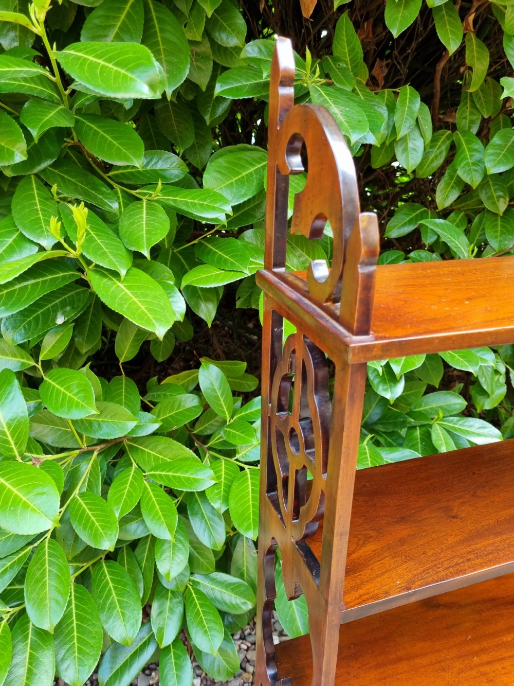 A LARGE CHIPPENDALE STYLE MAHOGANY SET OF FRETTED SHELVES View IV