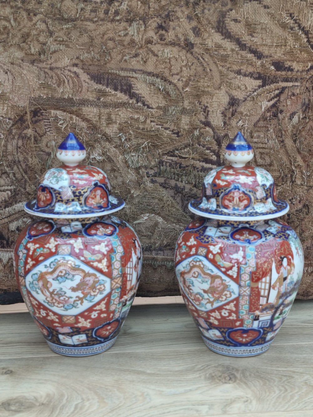 A GOOD LARGE PAIR OF 19THC IMARI VASES AND COVERS View V