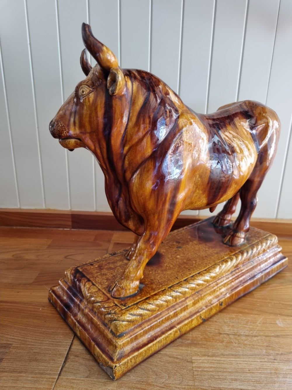 A LARGE POTTERY MODEL OF A BULL USED IN BUTCHERS SHOPS AS ADVERTISING View V