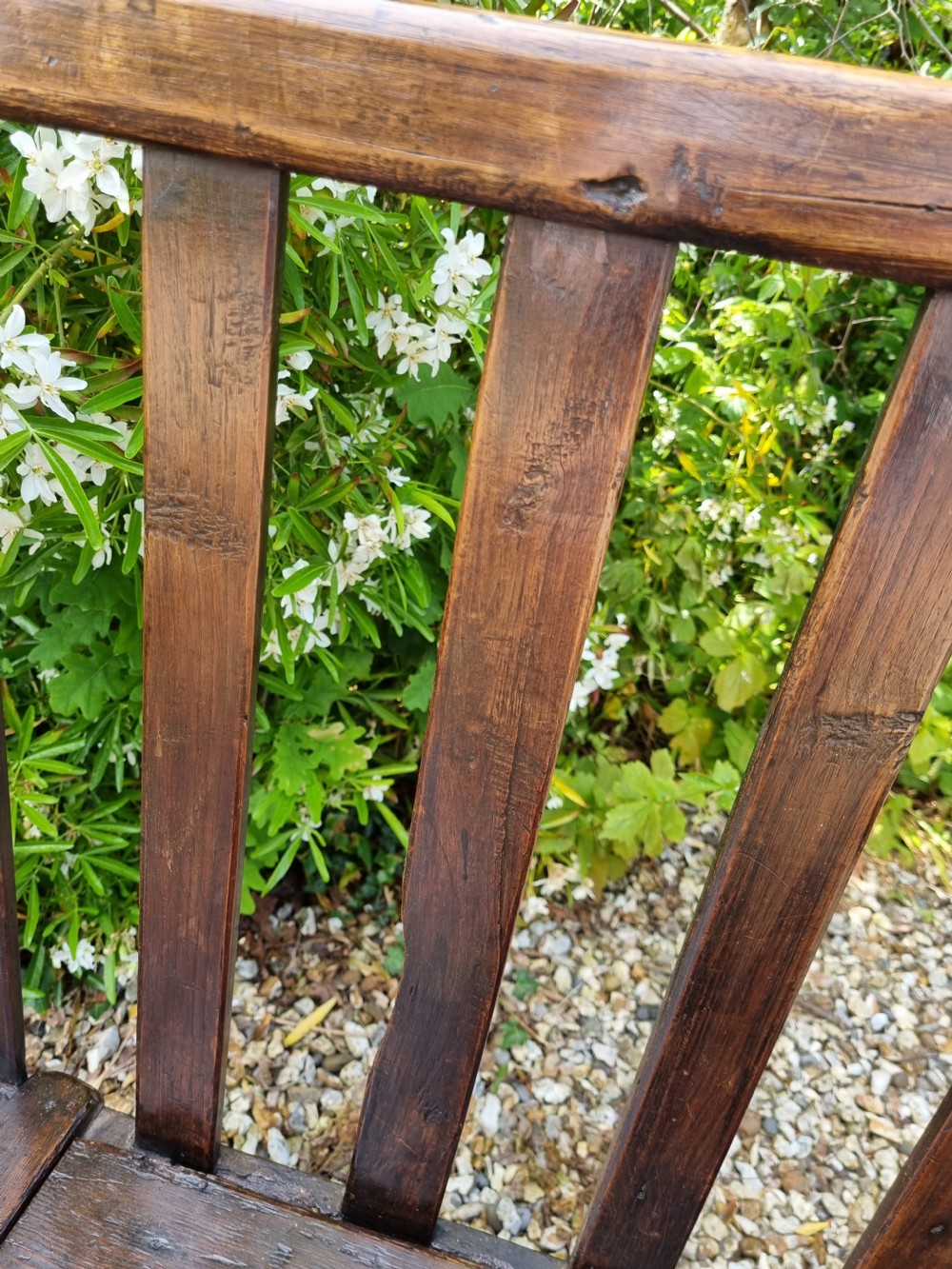 A RARE SMALL 18THC WELSH OAK AND PINE BOX SEAT SETTLE. View VI