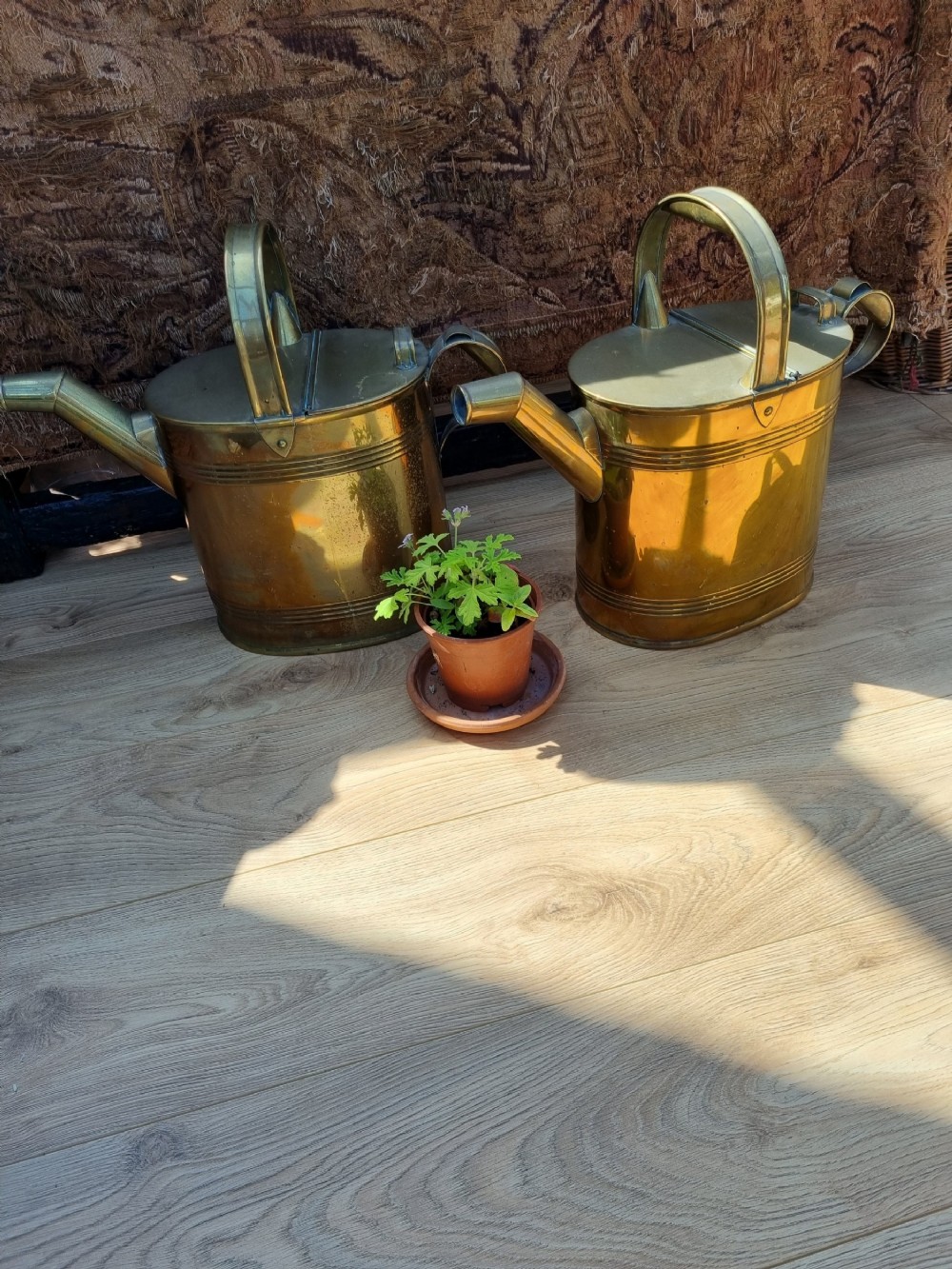 A GOOD PAIR OF LARGE ANTIQUE BRASS WATER CANS 