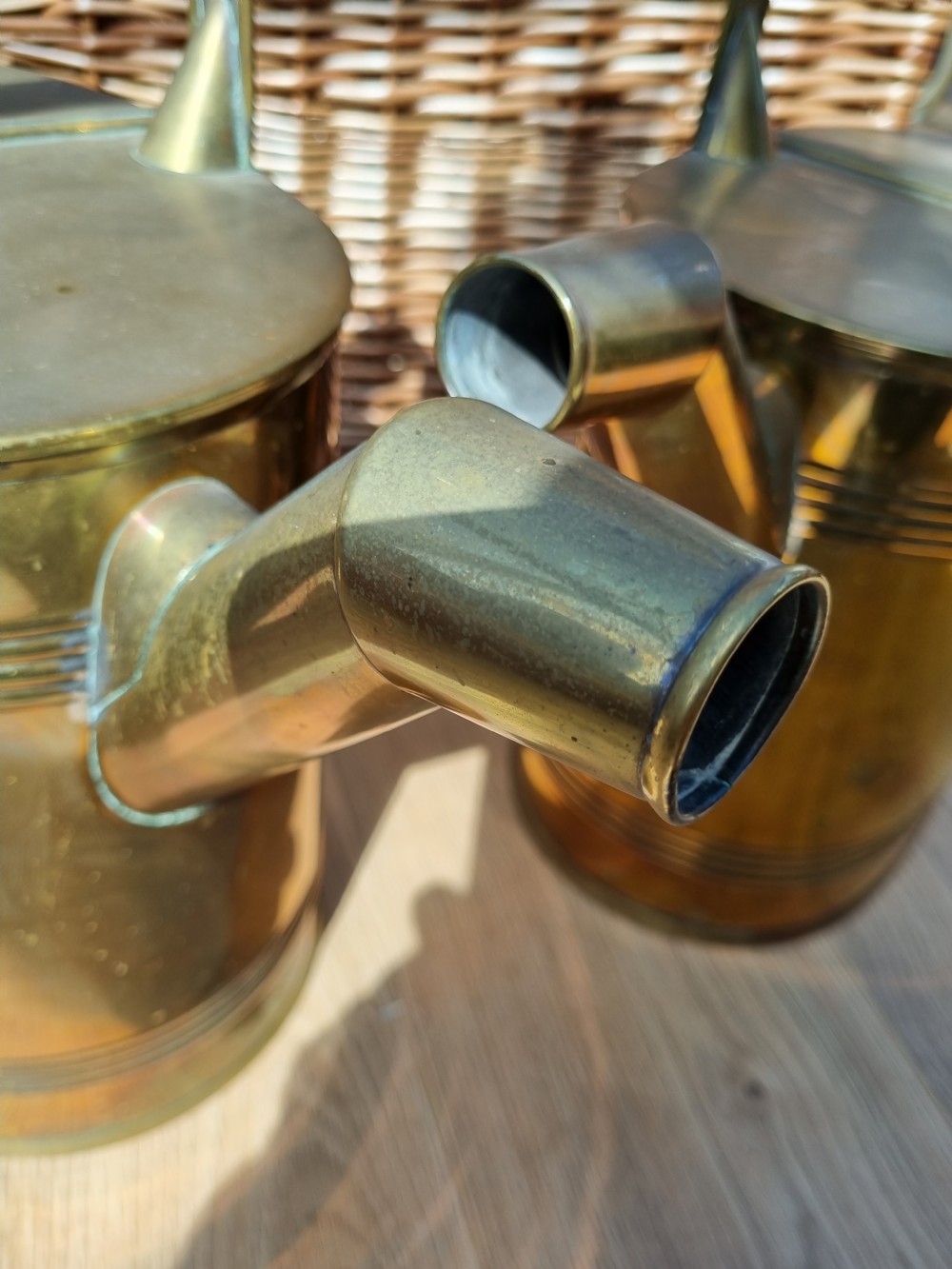 A GOOD PAIR OF LARGE ANTIQUE BRASS WATER CANS  View III