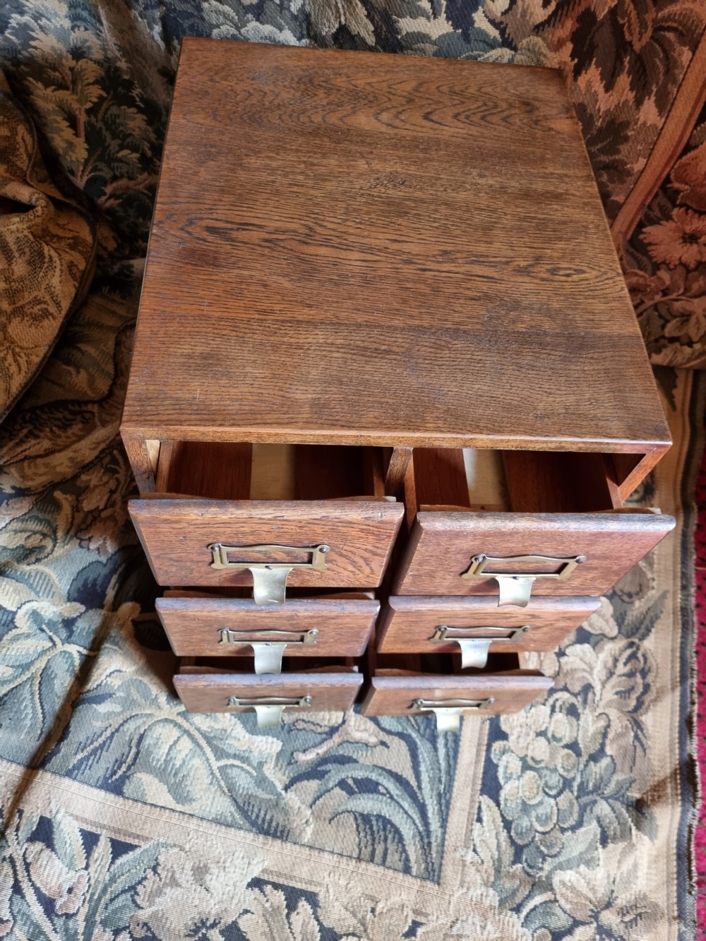 A SMALL OAK DESK TOP FILING CABINET  View II