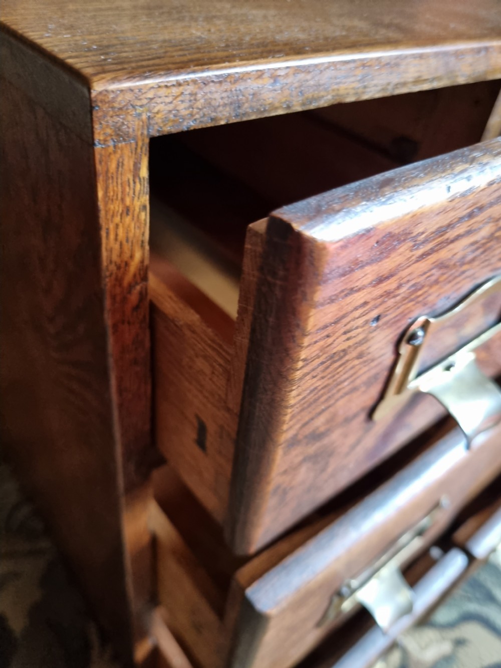 A SMALL OAK DESK TOP FILING CABINET  View III