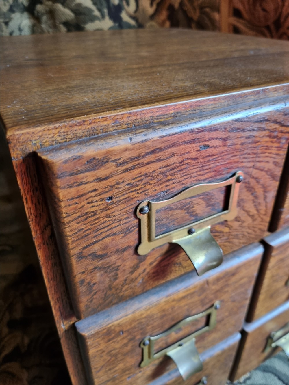 A SMALL OAK DESK TOP FILING CABINET  View V