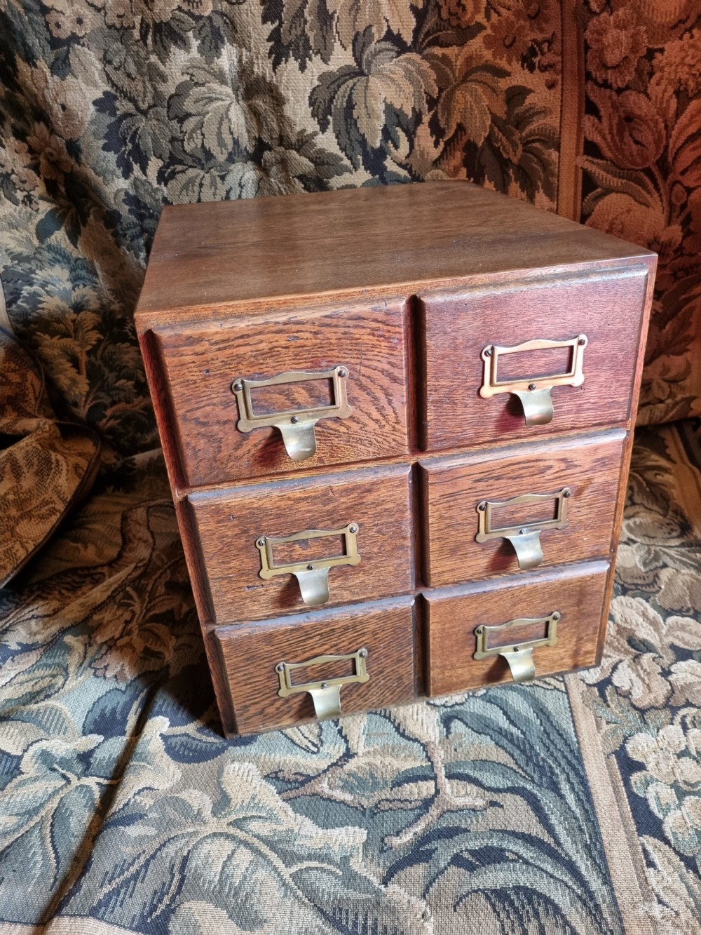 A SMALL OAK DESK TOP FILING CABINET  View VI