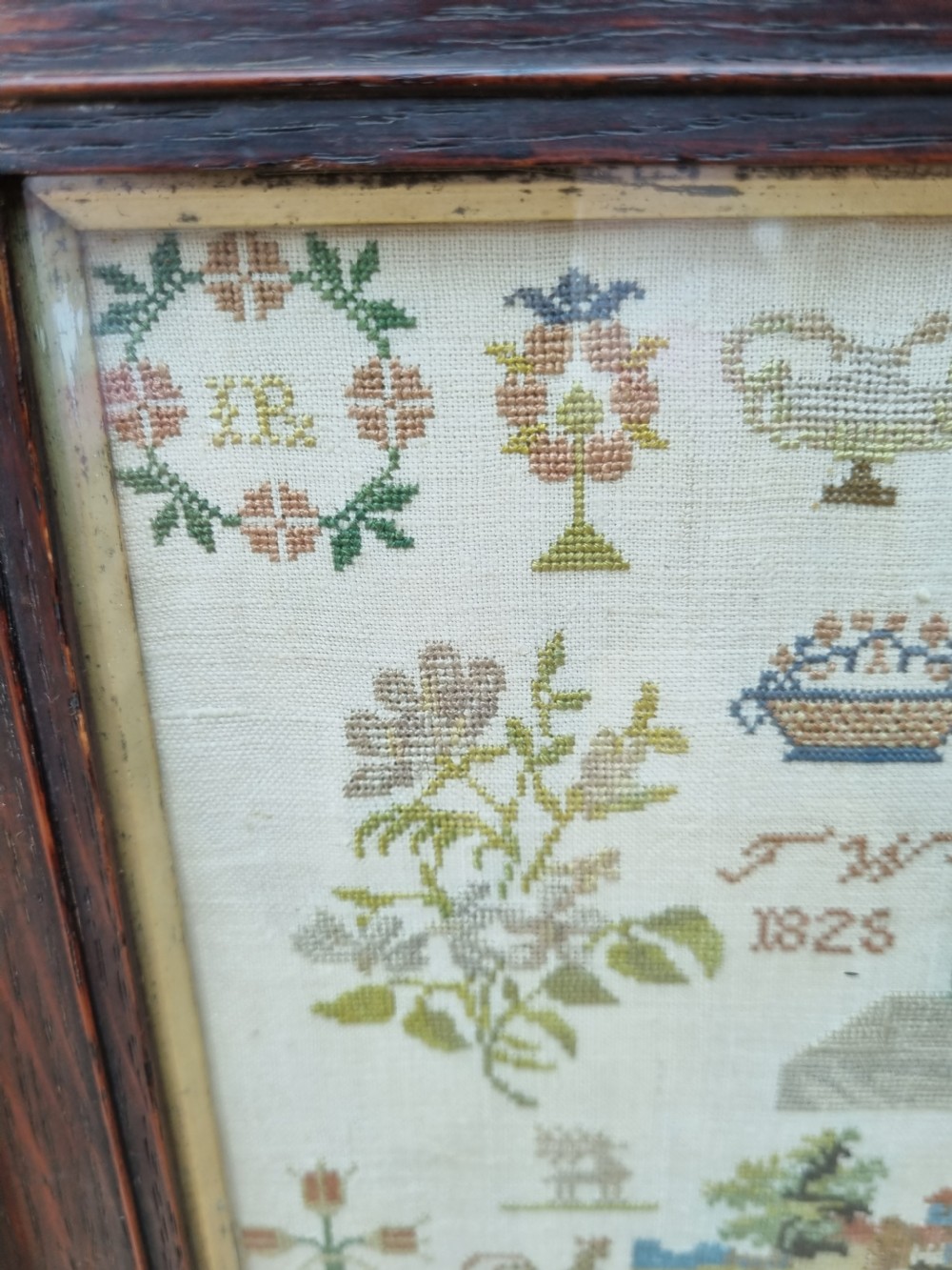 EARLY 19THC NEEDLEWORK SAMPLER IN OAK FRAME DATED 1825 INTIALLED JW View IV