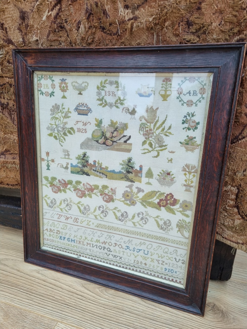 EARLY 19THC NEEDLEWORK SAMPLER IN OAK FRAME DATED 1825 INTIALLED JW View VI