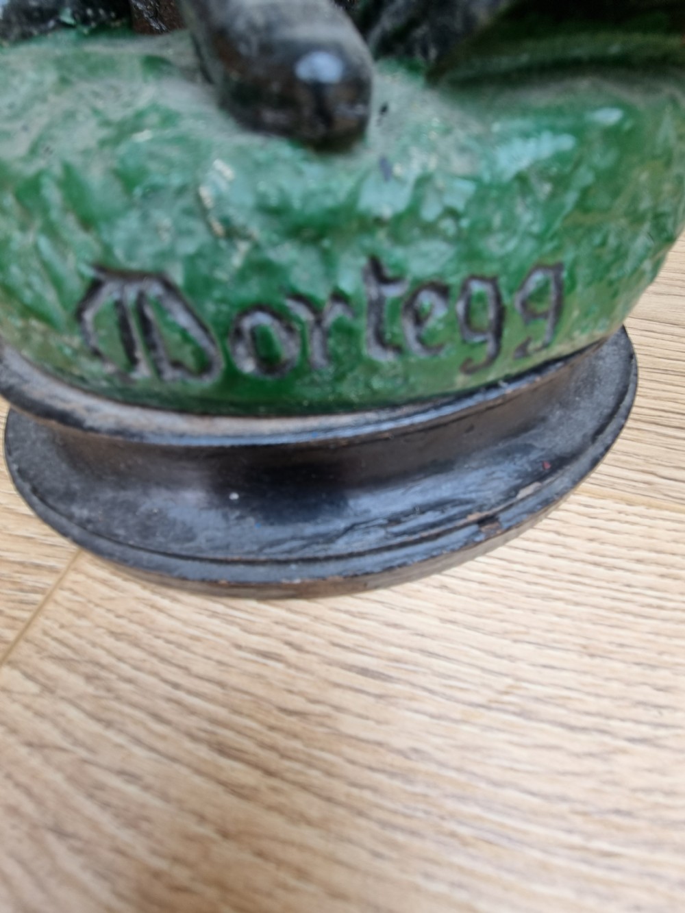 RARE ANTIQUE METAL ADVERTISING FIGURE MR MORTEGG. View II