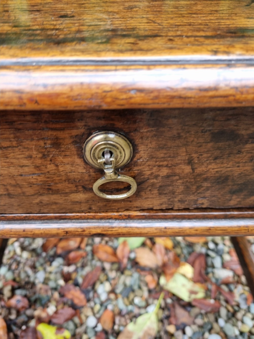 A SIMPLE HONEST EARLY 18THC OAK SIDE TABLE WITH DRAWER . View II