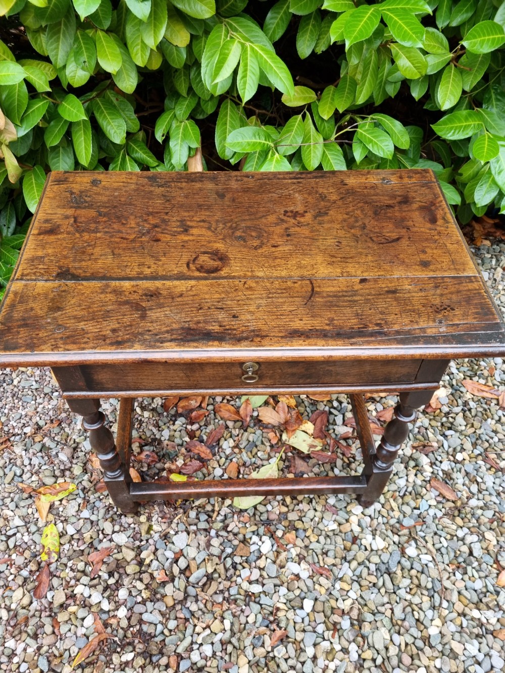 A SIMPLE HONEST EARLY 18THC OAK SIDE TABLE WITH DRAWER . View VII