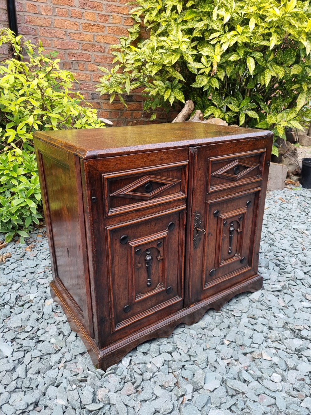 A LATE 17THC ENGLISH OAK WALNUT AND EBONY STANDING SPICE CUPBOARD C1710

 View II