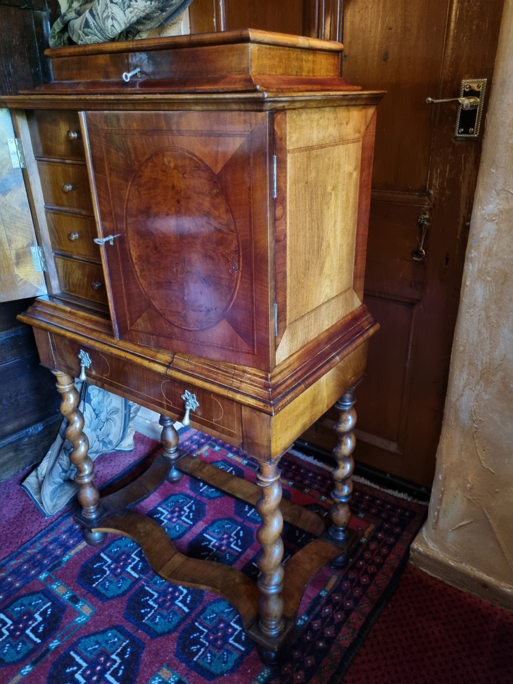 GOOD SMALL 19THC WALNUT FITTED CABINET ON BARLEY SUGAR STAND . View V