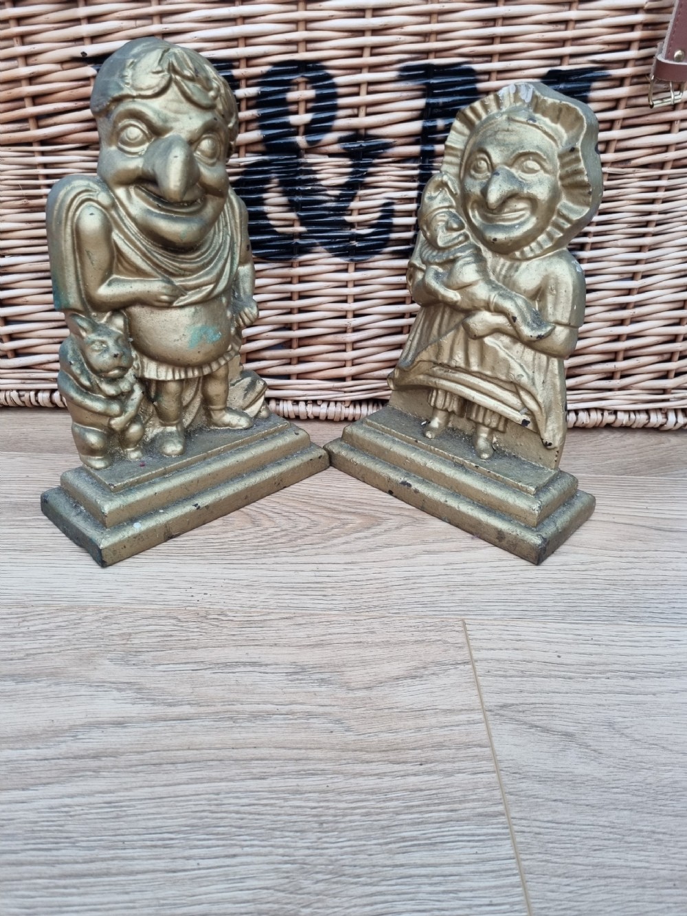 A SUPER LARGE 19THC PAIR OF PUNCH AND JUDY CAST IRON DOOR STOPS