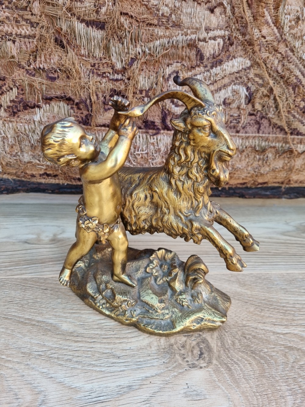 QUALITY 19THC GILT BRONZE OF A CHERUB PLAYING WITH A GOAT  View VI