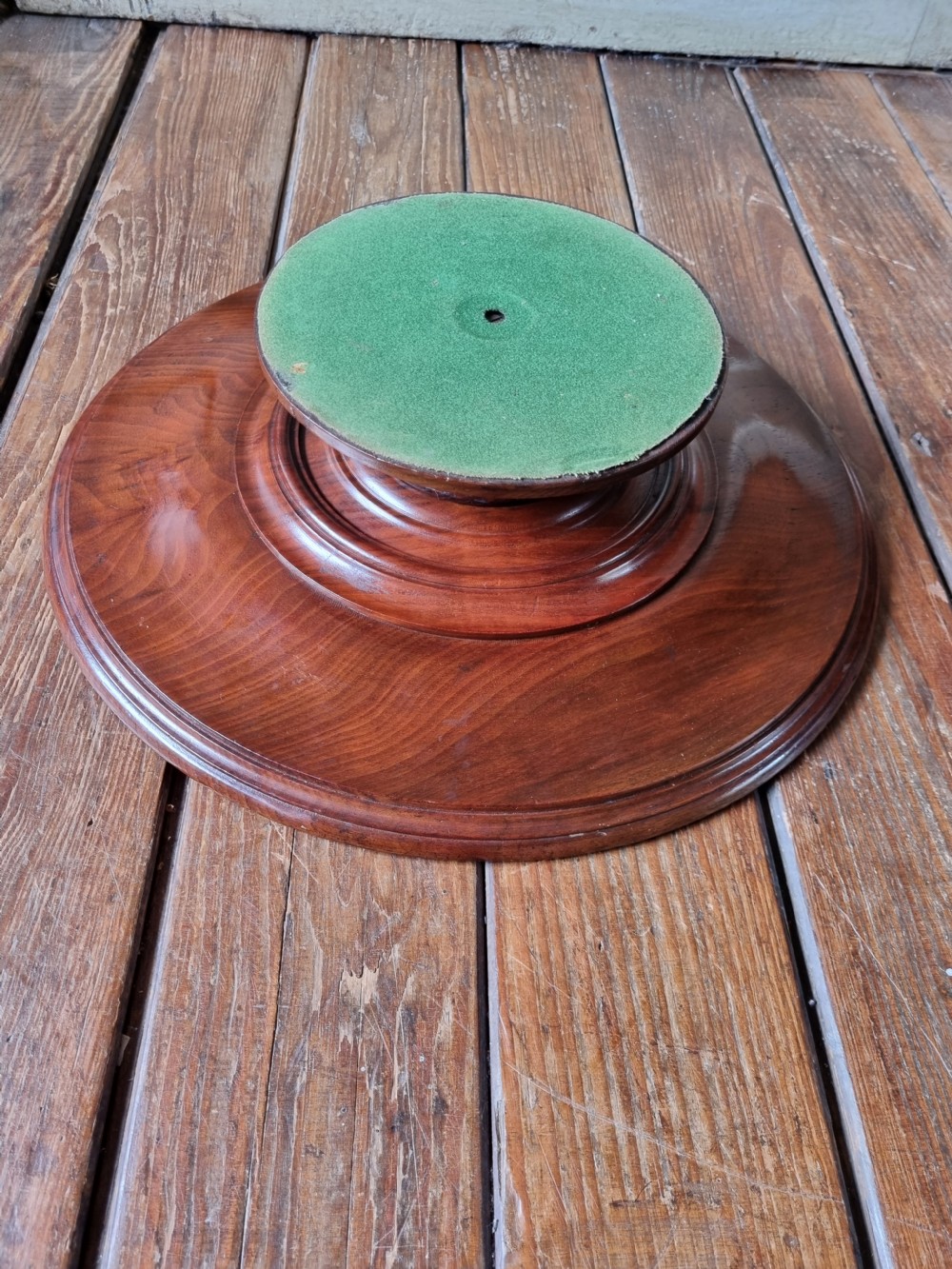 A circular Georgian mahogany Lazy Susan featuring a raised moulded rim and rich wood grain. View II