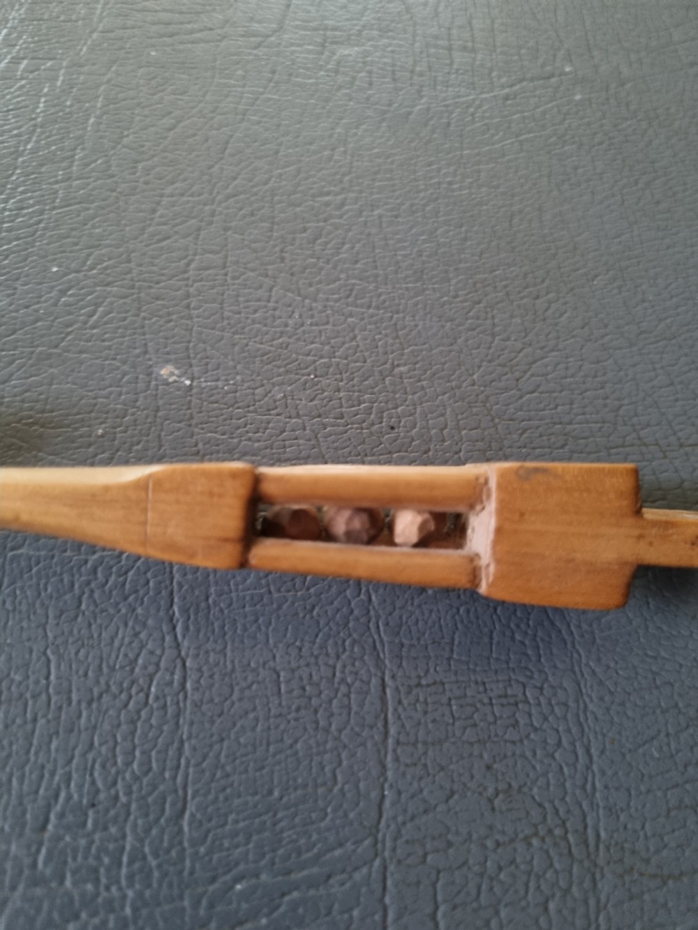 A SMALL ANTIQUE SYCAMORE WELSH LOVE SPOON . View II