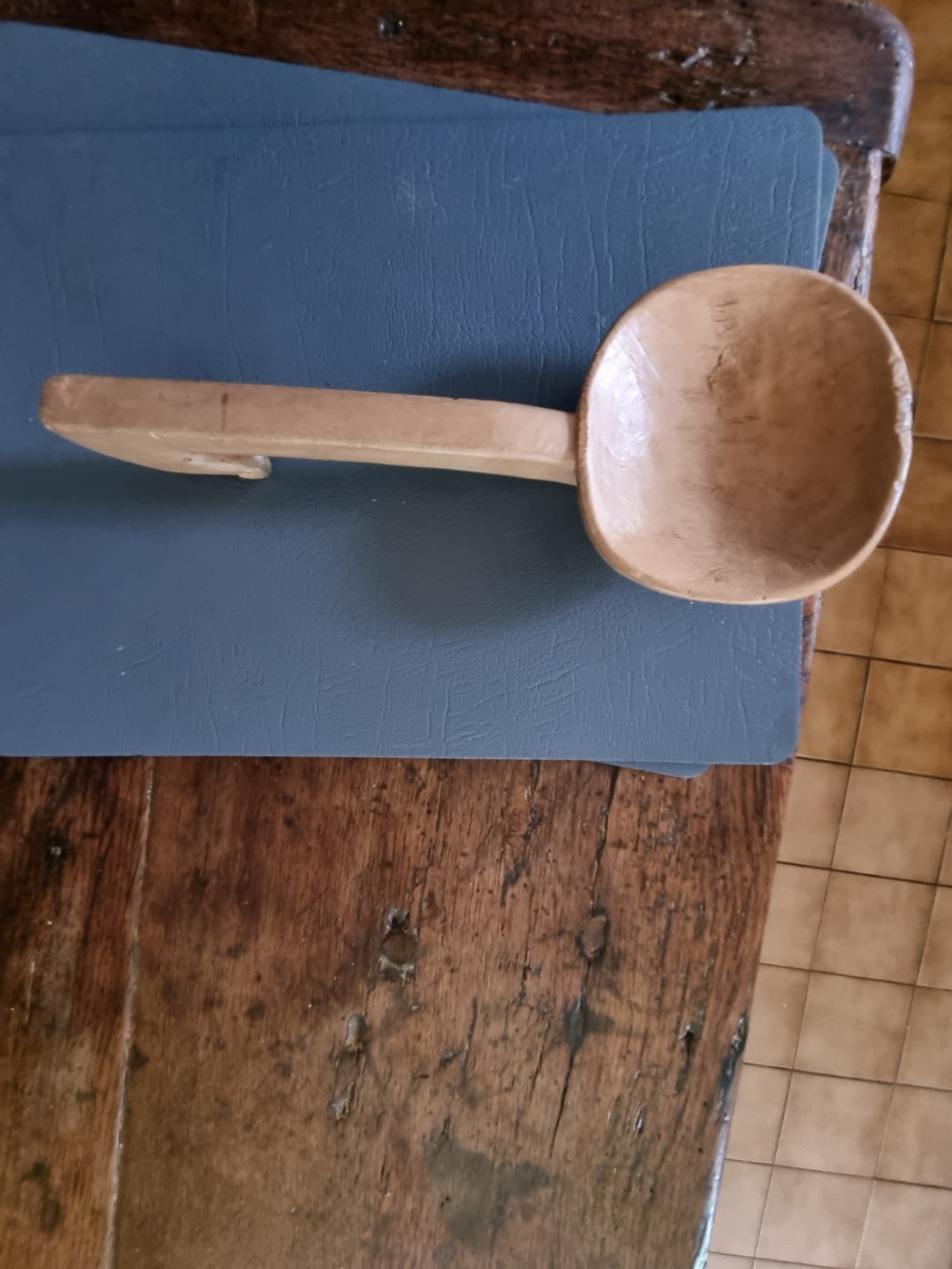 A 19th-century hand-carved Welsh sycamore wooden ladle with a rounded bowl and a hooked handle terminal. View VII