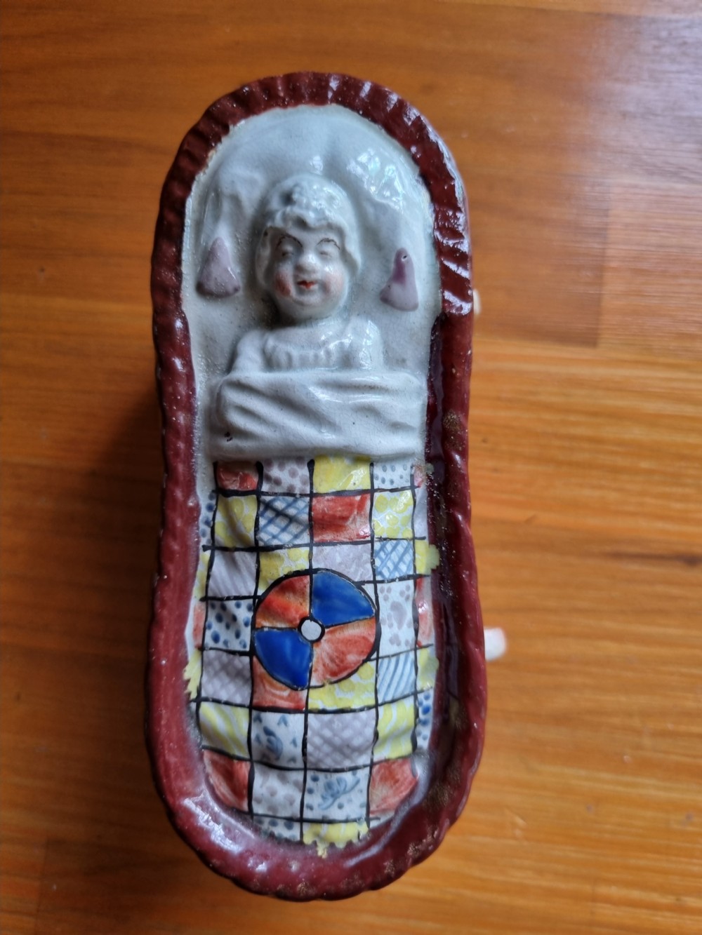 GOOD YORKSHIRE PRATTWARE POTTERY BABY IN A CRIB View IV