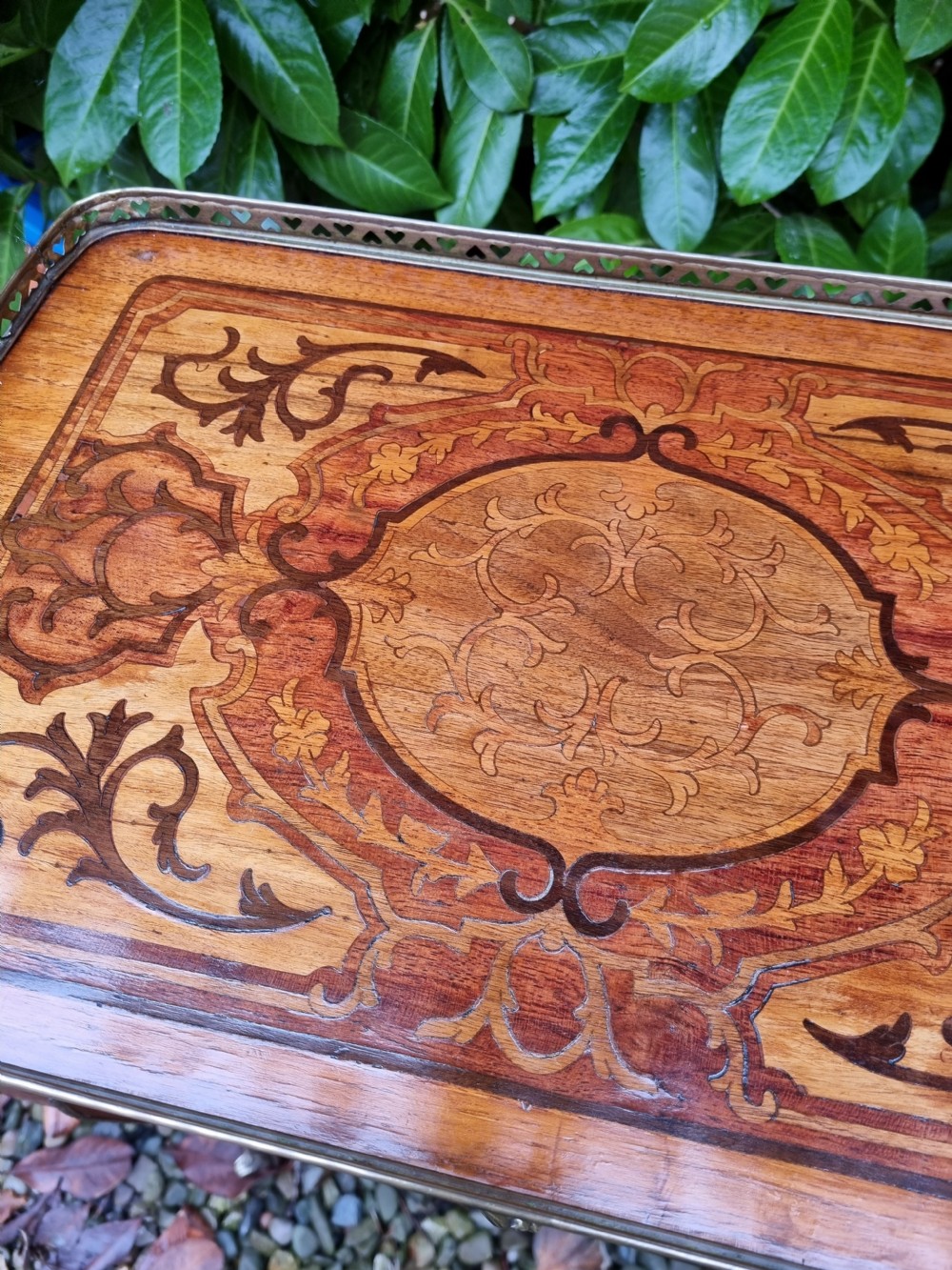 A 19th-century French kingwood side table featuring marquetry inlay, a single drawer, an under-shelf, cabriole legs, and a pierced brass top gallery. View III